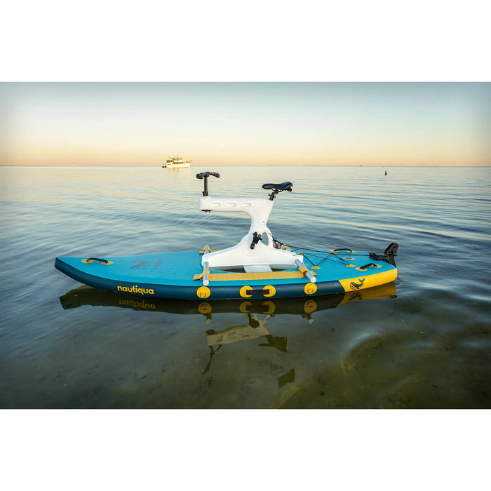 Blue and black stand-up paddleboard with a white motor on calm water at sunset.