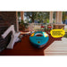 Inflatable kayak on a wooden deck with assembly tools and text overlay.