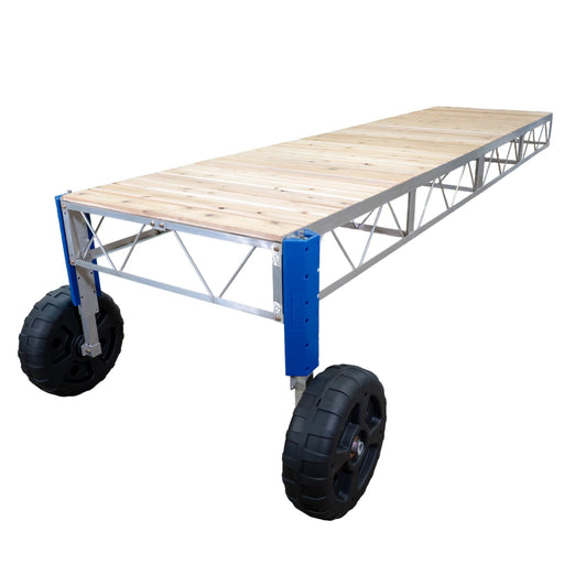Portable stage platform with wooden deck and wheels on a white background