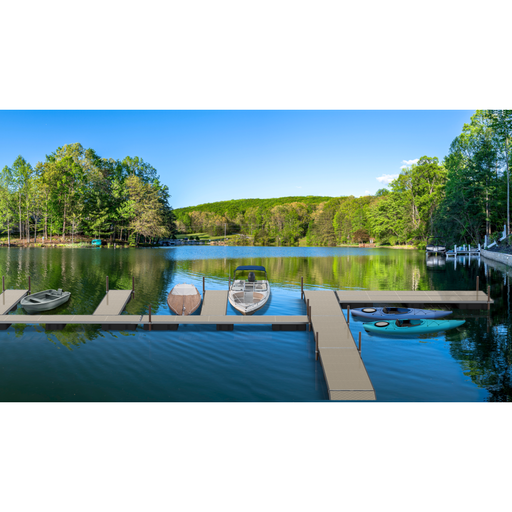 Lake with dock and boats surrounded by trees on a clear day