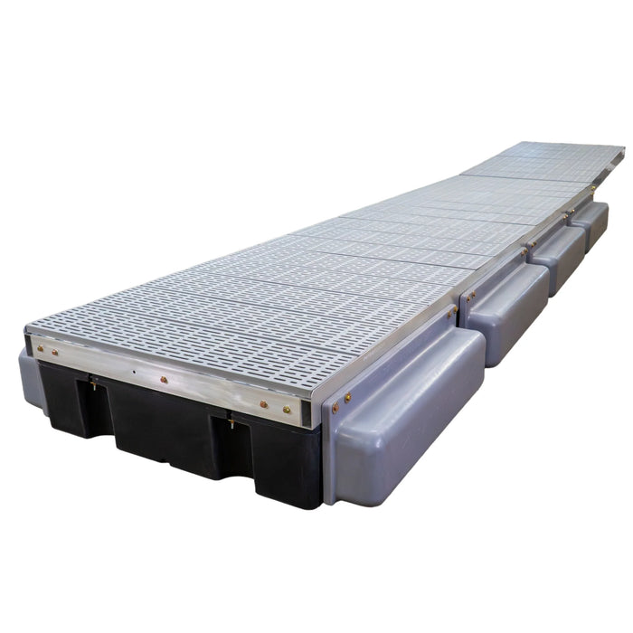 Long metal platform with grating on a white background