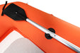Orange inflatable kayak with a black paddle on a white background