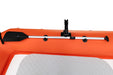 Orange inflatable kayak with a paddle on a white background
