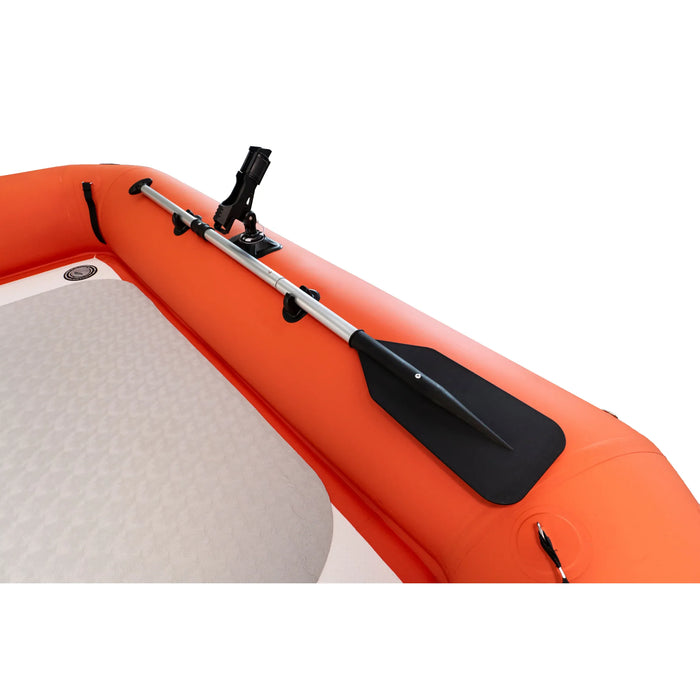 Orange inflatable boat with a black paddle attached on a white background