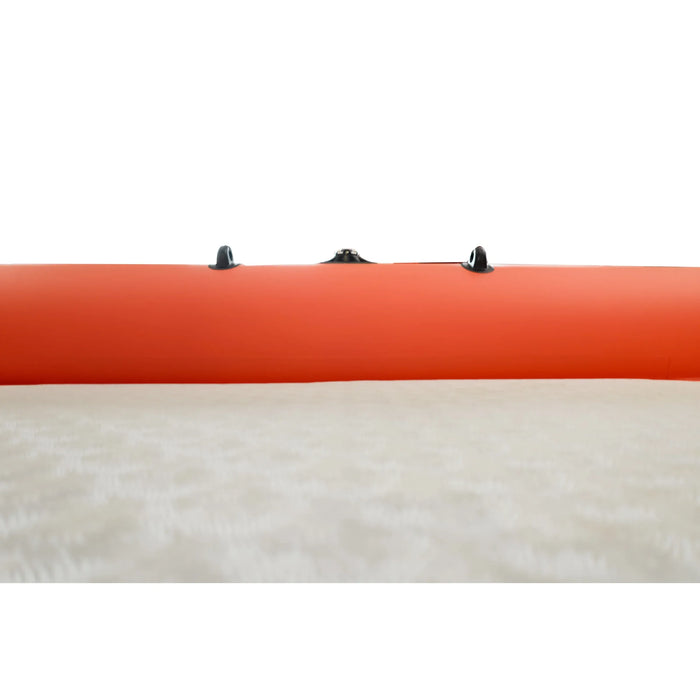 Close-up of an orange kayak with black straps on a white background