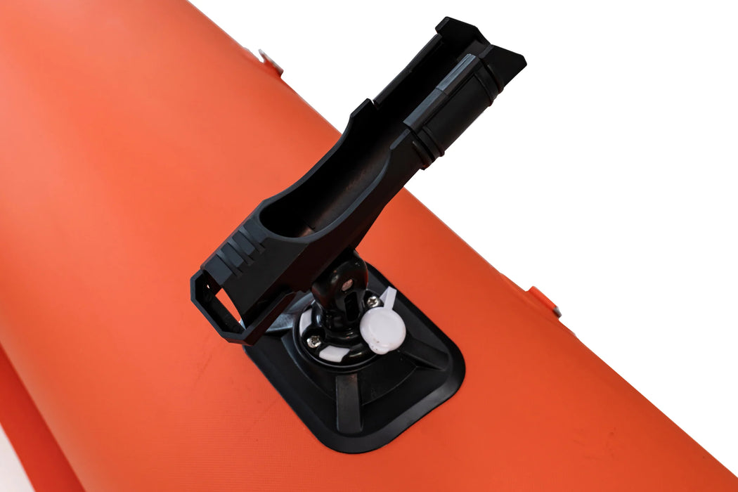 Black phone mount on an orange surface