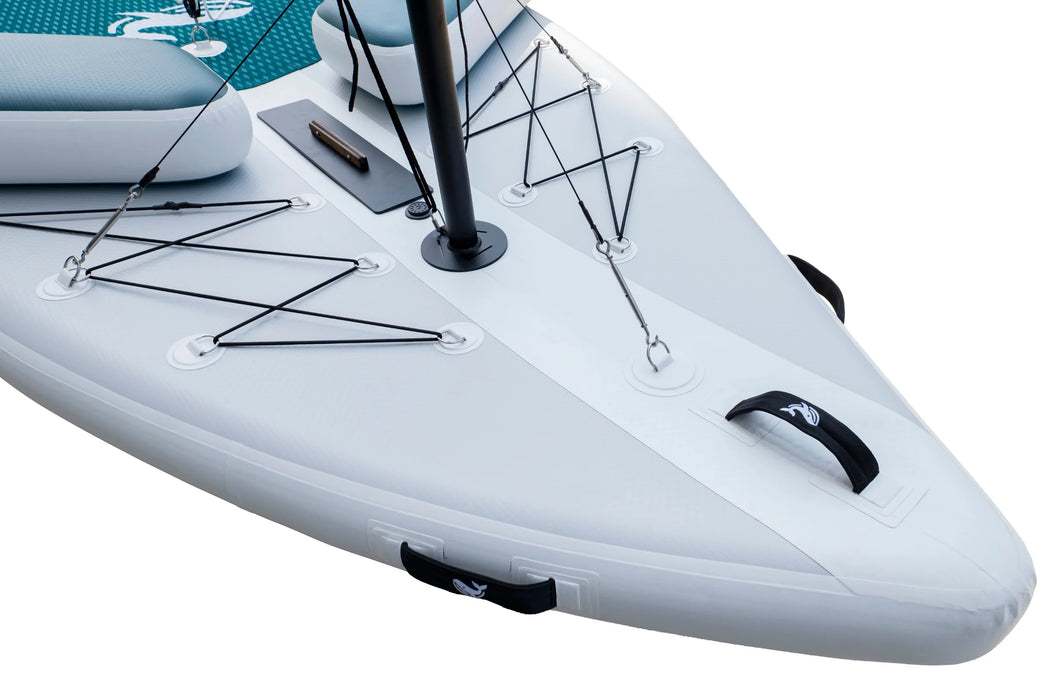 Close-up of an inflatable kayak with a white and teal design on a white background
