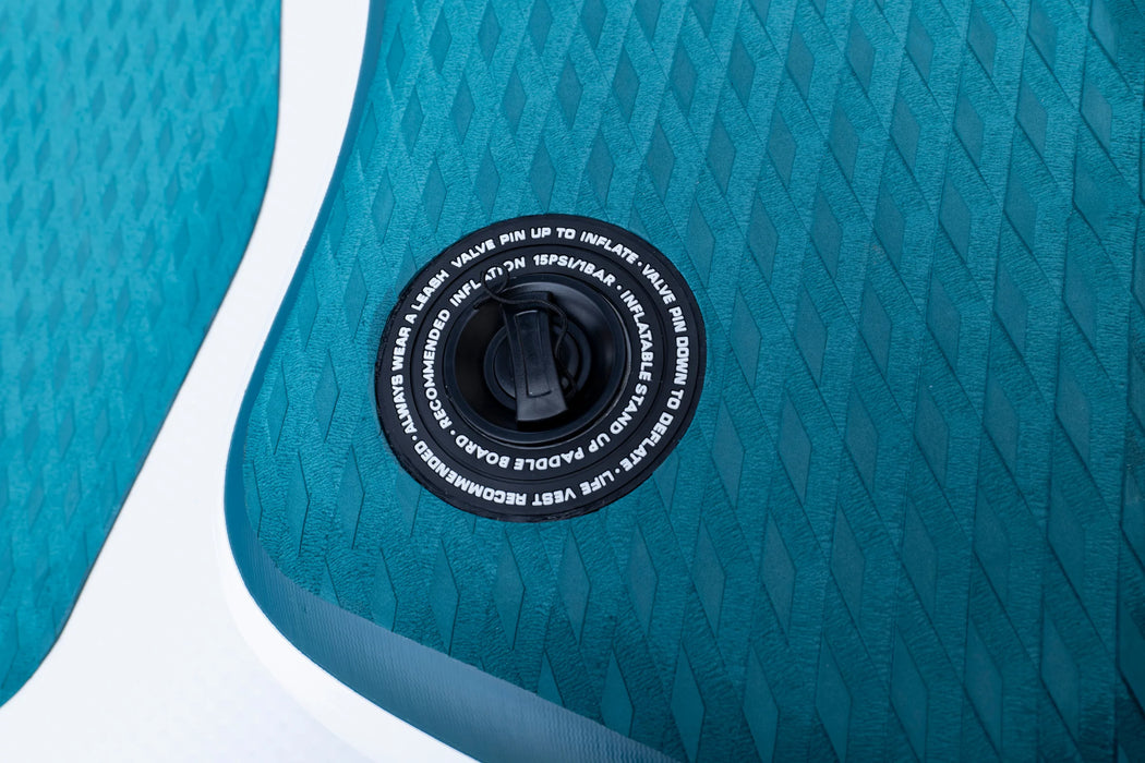 Close-up of a teal inflatable pool with valve cap detail