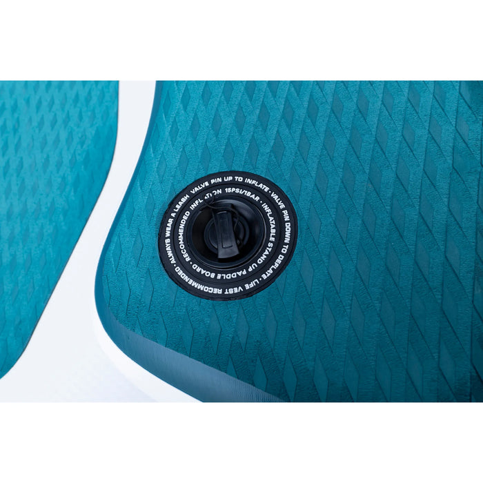 Close-up of a teal inflatable pool with valve cap detail
