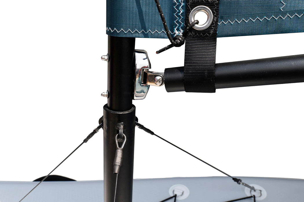 Close-up of a kayak with a blue cover and black support structure on a white background