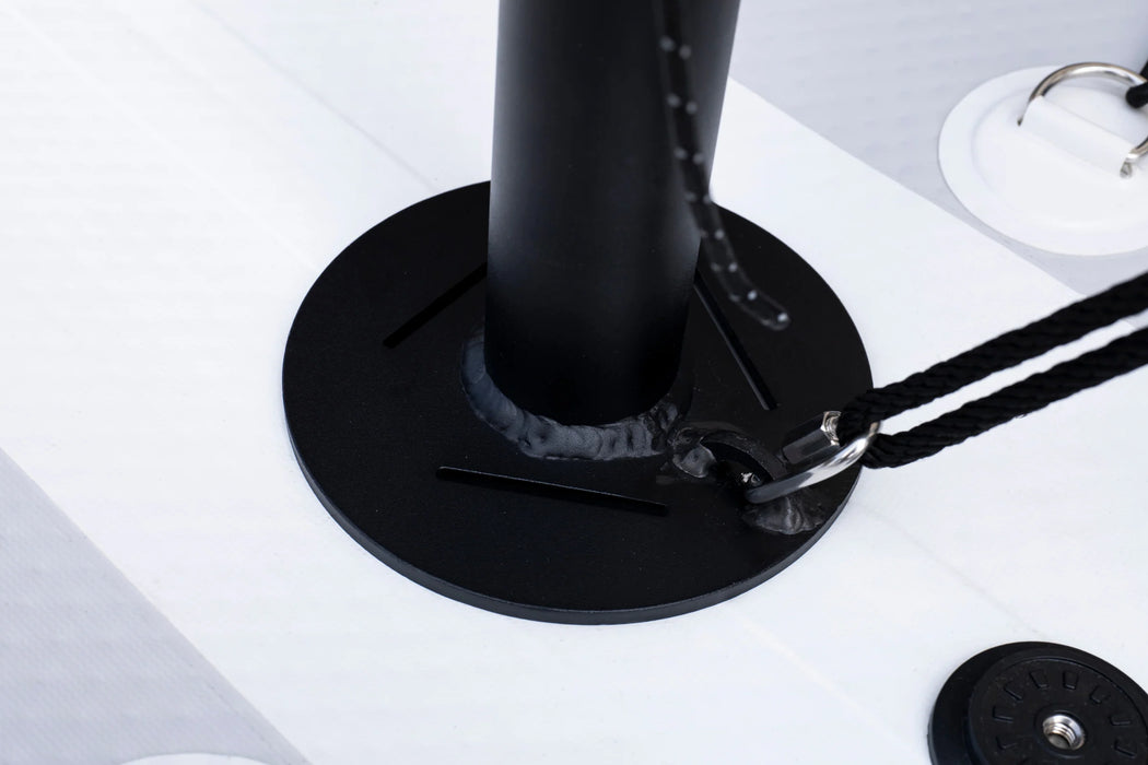 Black adjustable stand on a white surface