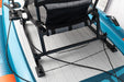 Inflatable kayak with a mounted fishing chair on a white floor.