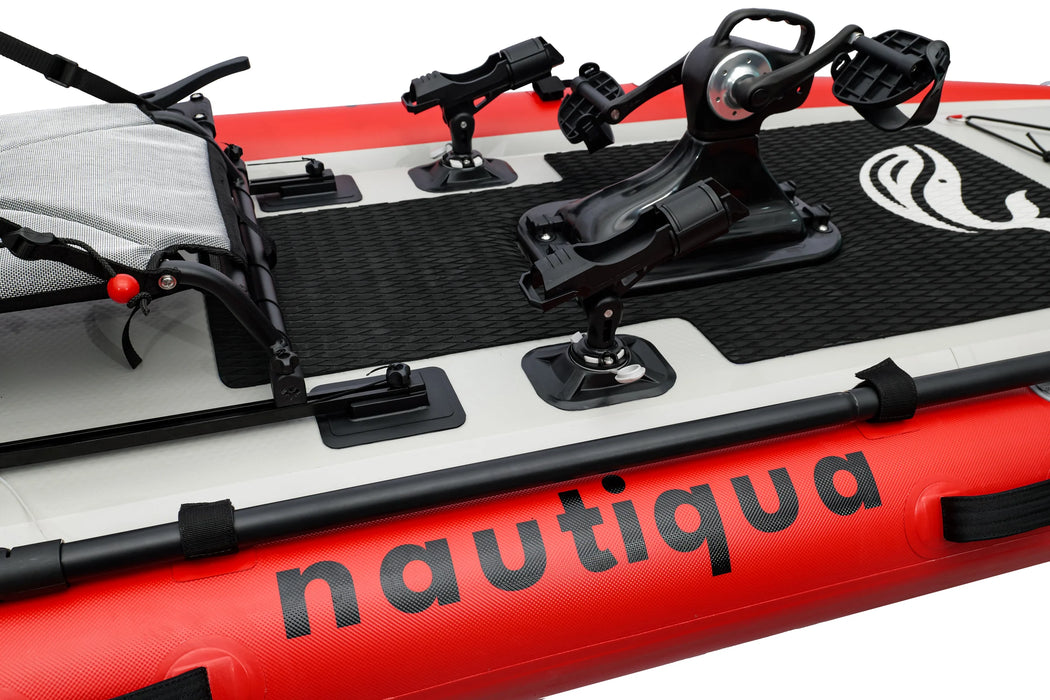 Close-up of an inflatable kayak with 'nautiqua' branding on a red, white, and black background.