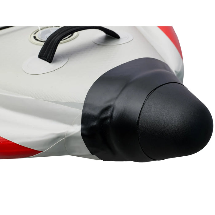 Close-up of a motorcycle exhaust with black muffler and red and white body