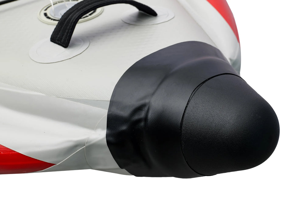 Close-up of a motorcycle exhaust with black muffler and red and white body