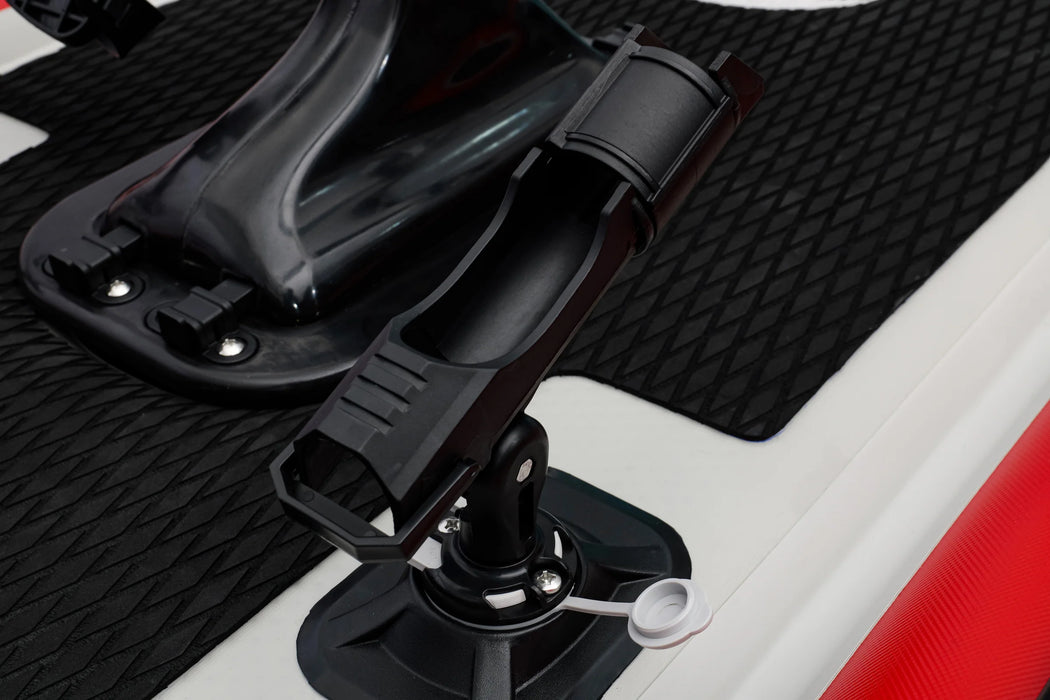 Close-up of a car seat belt buckle and strap on a vehicle interior.