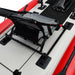 Black kayak seat mounted on a red and white kayak