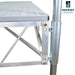 Metal dock leveler with 'Patriot Docks' logo on a white background